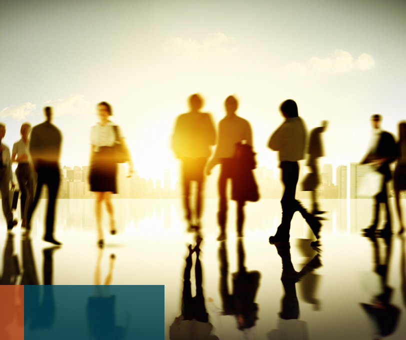 Business professionals walking at sunrise, representing trusted advice for UK SMEs